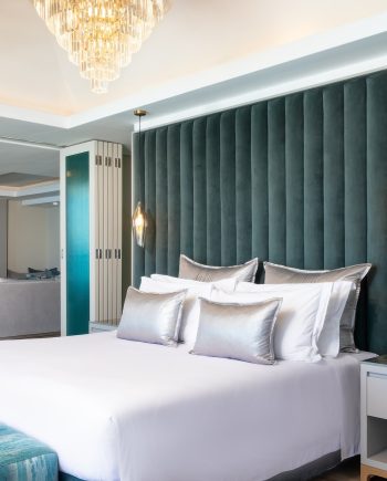 6. Penthouse Suite Bed and living area